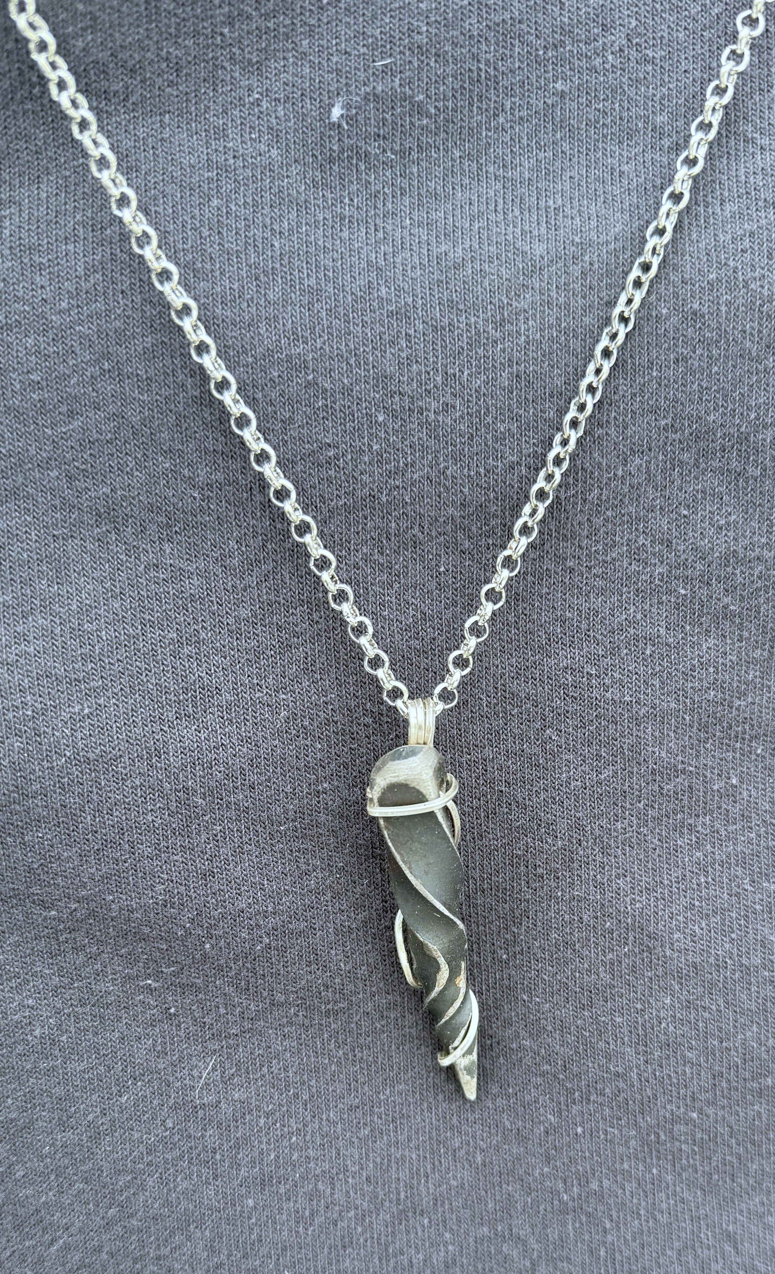 Wire wrapped steel "unicorn horn" necklace