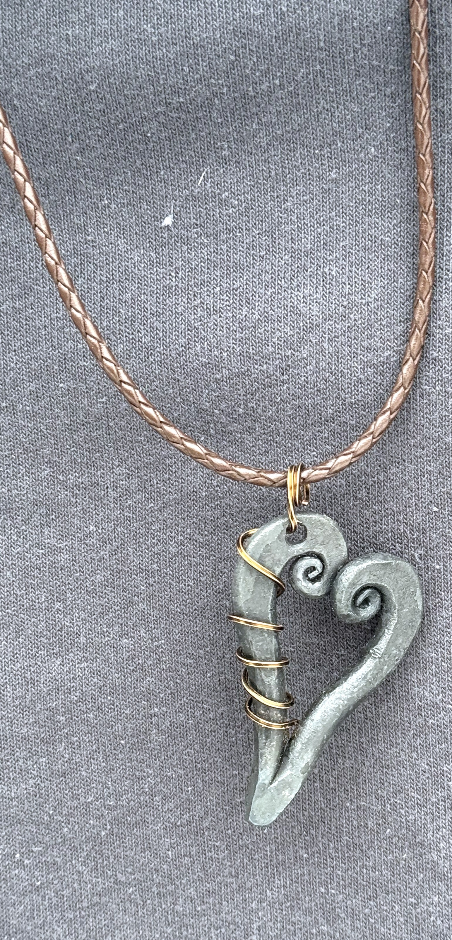Wire wrapped steel heart necklace